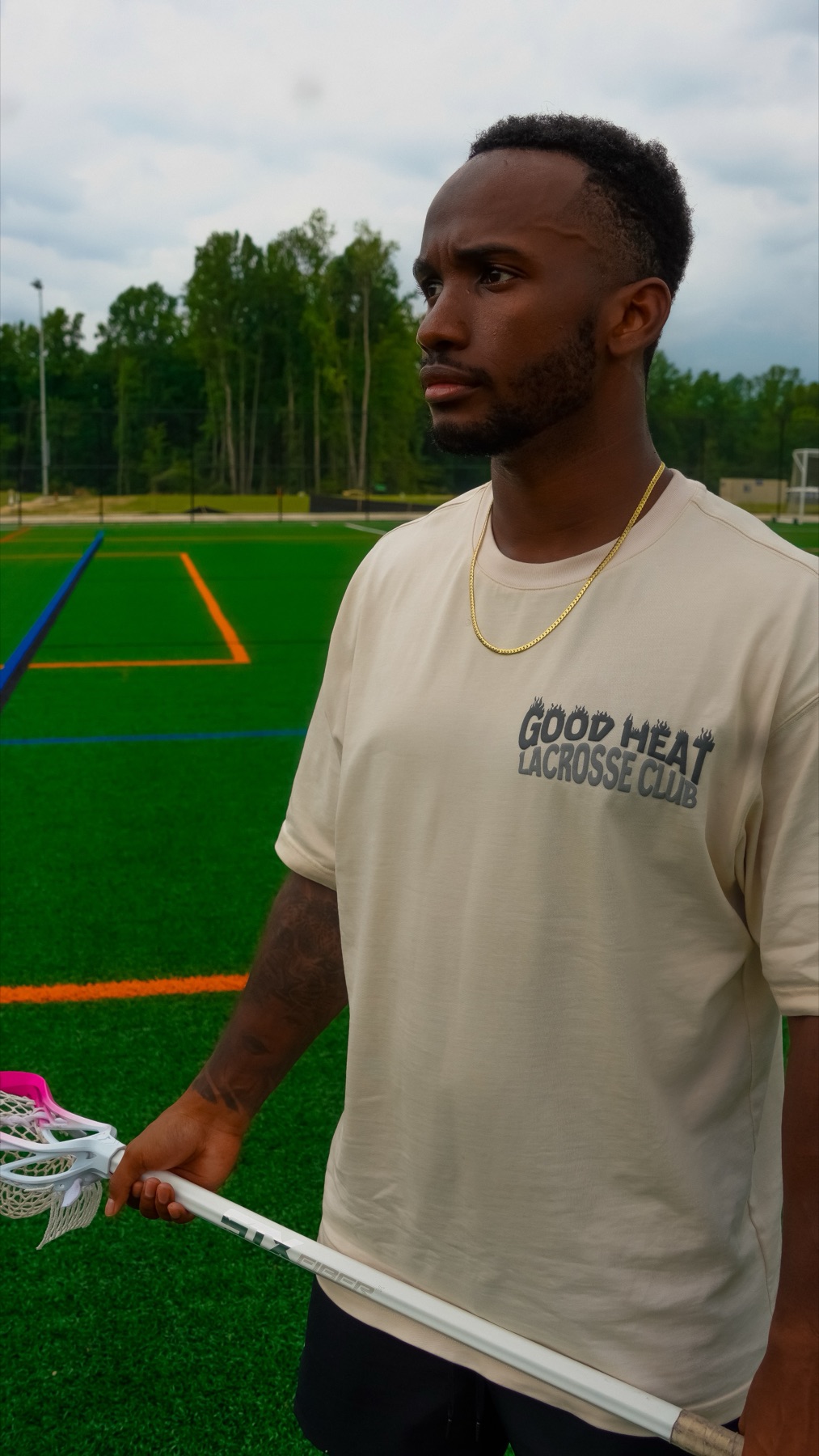 GoodHeat Lacrosse Club tee on the field